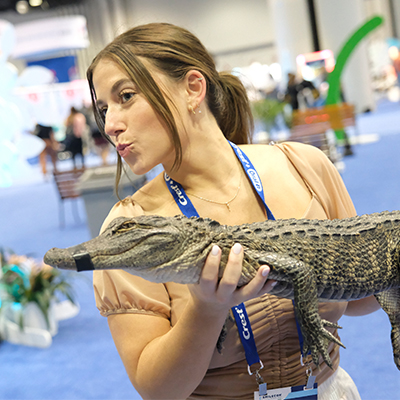 SmileCon attendee with small aligator
