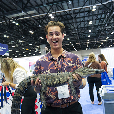 SmileCon attendee with a gator