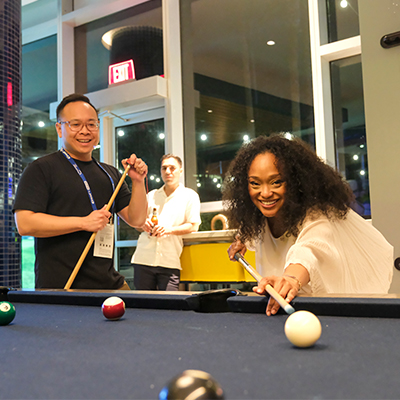 SmileCon attendees play billiards
