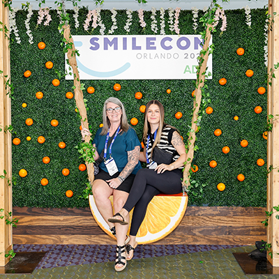 SmileCon attendees in the Future Booth swing