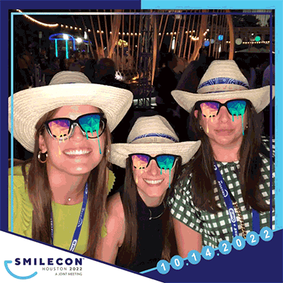 Smiling Attendees at SmileCon 2022 with fun photo filter